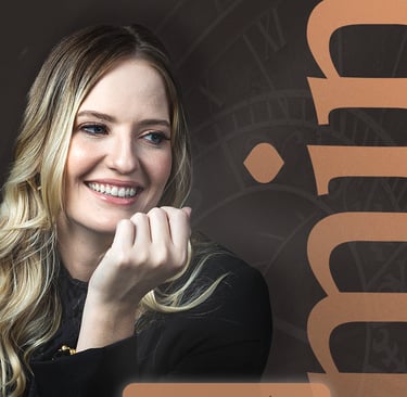 a woman with blonde hair and a black top yasmin belini