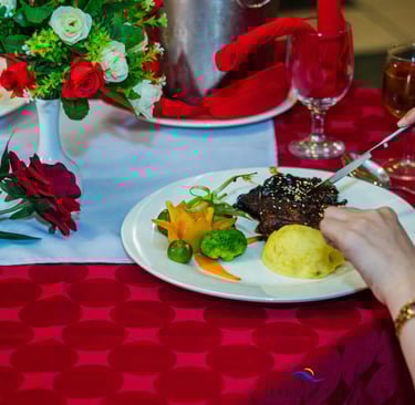 a woman is eating a meal at a restaurant