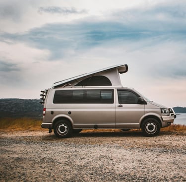Modern campervan near lake