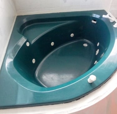 Old and outdated bathtub with jets
