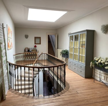 The magnificent interior staircase of the Maison de Maître, manor house