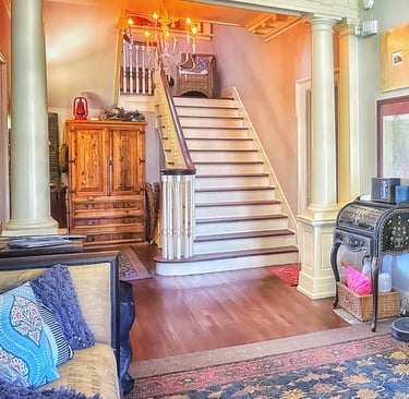 foyer and grand staircase 2123 rivermont apartments