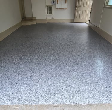 Decorative flake MMA garage floor with seamless coving