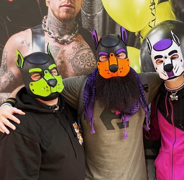 Four friends posing in pup masks.