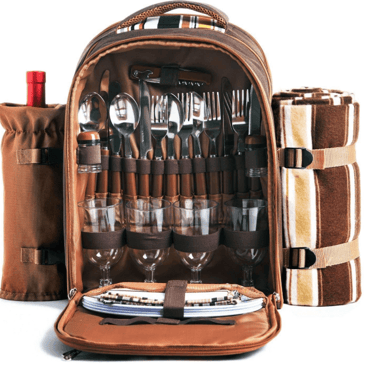 a picnic set up with a wine bottle