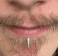 Safe lip piercing performed with hypoallergenic jewellery