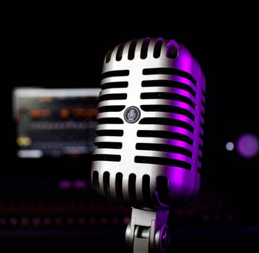 old microphone in recording studio with purple glow