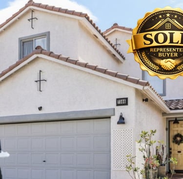 a house with a sold sign and a sold sign