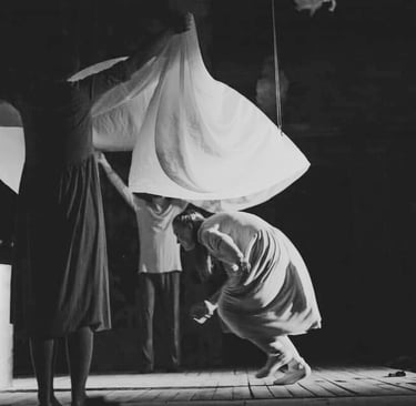 a man and woman in a dance pose