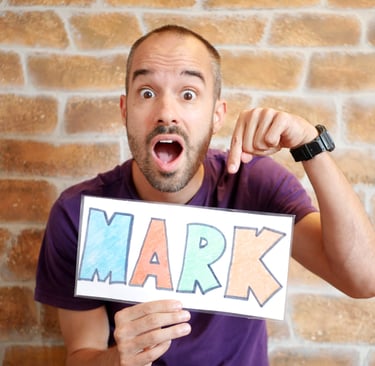 mentor mark holding sign fun play creativity
