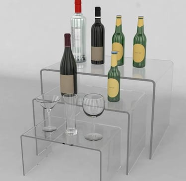 Acrylic risers elegantly presenting wines and glasses, perfect for showcasing and tastings.