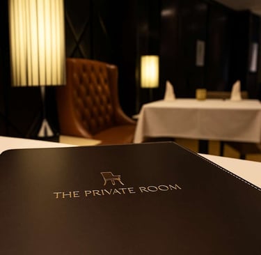menu folder on a table in a dimly lit lounge