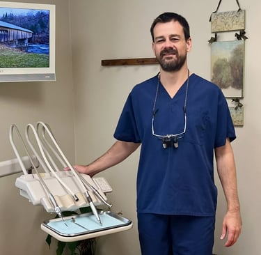 smiling dentist welcoming new patients