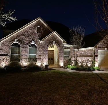 landscape lighting along front facade of house