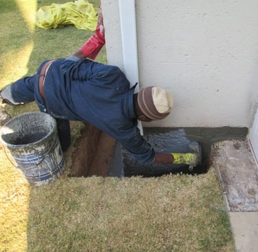 Specialized sealer coat application for foundation layer bricks below ground level to prevent ingress, Randburg