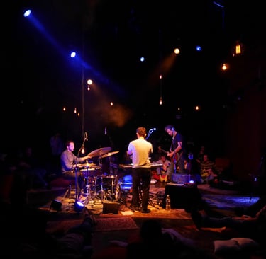 Dorian Chamoin playing music in a theater