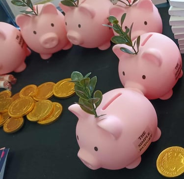 The Simple Budget Piggy Banks with gold coins