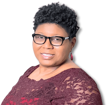 Tameka Chapman smiling in burgundy dress and black glasses