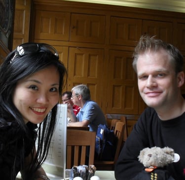 a man and woman sitting at a table