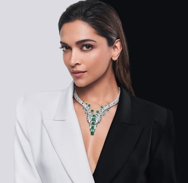 Deepika Padukone wearing Cartier emerald and diamond necklace.