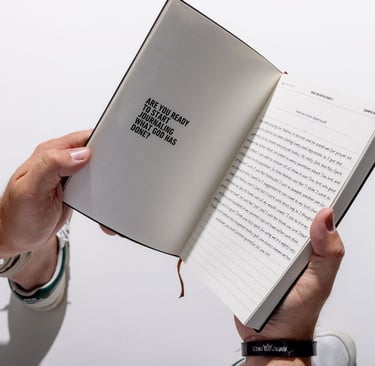 a man holding a book with are you ready to start journaling