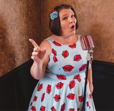 a woman in a dress with lipstick lips on her lips