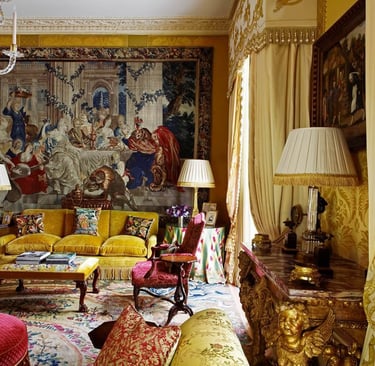 a living room with a couch and a chandelier Nour Nagy Designs London interior Design