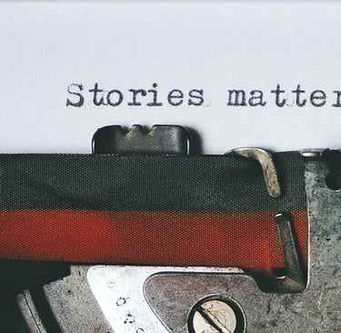 A vintage typewriter with "Stories matter" typed, highlighting storytelling.