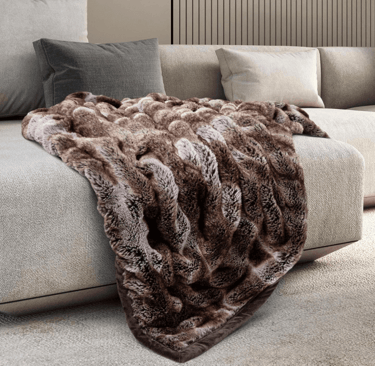 a couch with a blanket on it