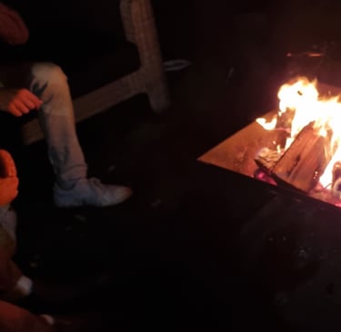 People standing around our firepit that we sell