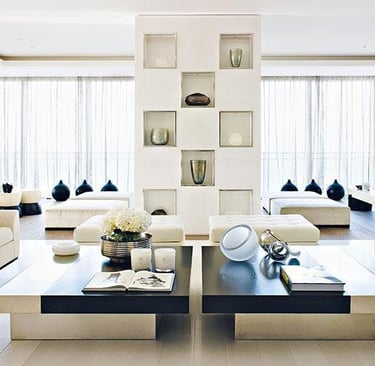 a living room with a couch and a table Nour Nagy Designs London interior Design