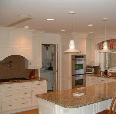 Custom white kitchen cabinet installation in remodeled Glenview kitchen