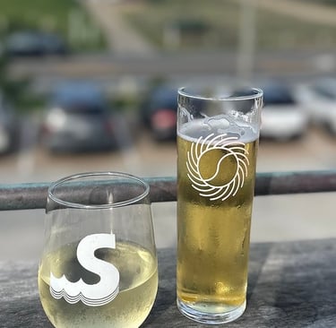 glasses of beer on a ledge swellsa brewing