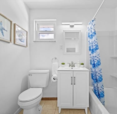 This family-friendly vacation home boasts a spacious backyard with outdoor seating and kids swings; 