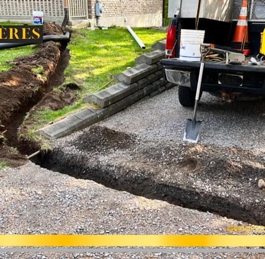 Nettoyage de gouttières à Québec et installation de drains de surface – préparati