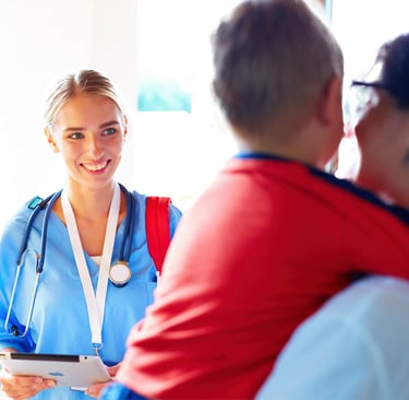 a nurse in a blue scrub suit arriving at patient's home
