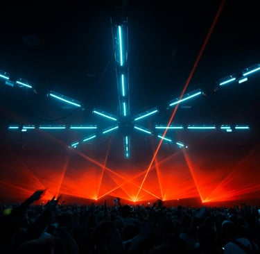 Futuristic neon lights and red lasers over concert crowd.