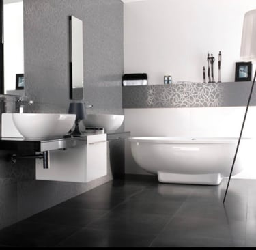a bathroom with a white sink and a large mirror