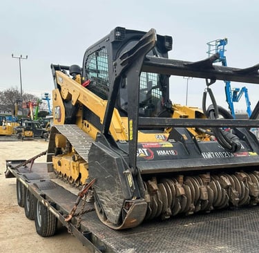 skid steer with mulching attachment