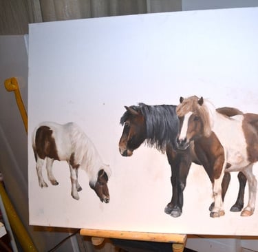 a painting of three ponies drawn on a canvas