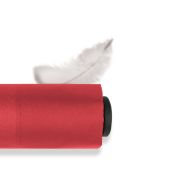 Doppler umbrella shown with a feather, representing the motto ‘Light as a Feather’