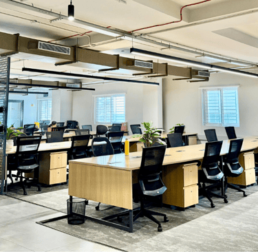a large conference room with a table and chairs- ClayWorks 371