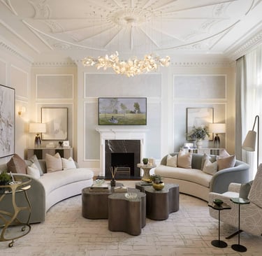 a living room with a couch and a chandelier Nour Nagy Designs London interior Design