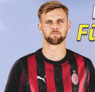 a man in a striped shirt and a soccer ball