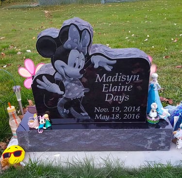 custom headstone in jet black granite installed in Kendallville, IN