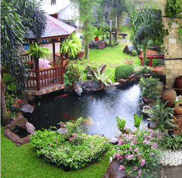 a garden with a pond and a gazeboar