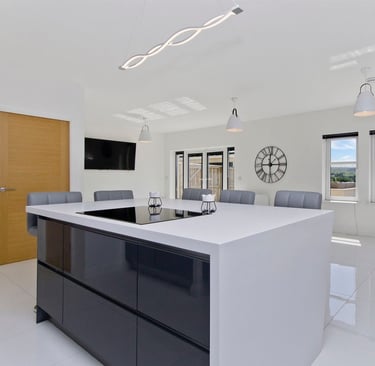 Luxurious bespoke kitchen in East Kilbride featuring Hi-Max countertops and integrated appliances