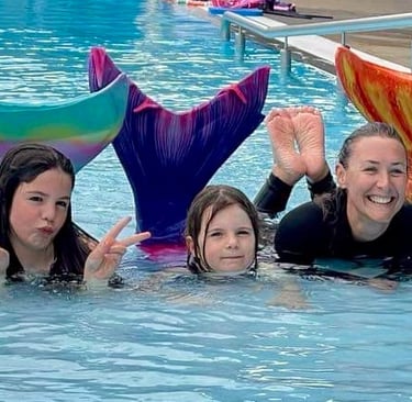 Kids learning to swim like a mermaid