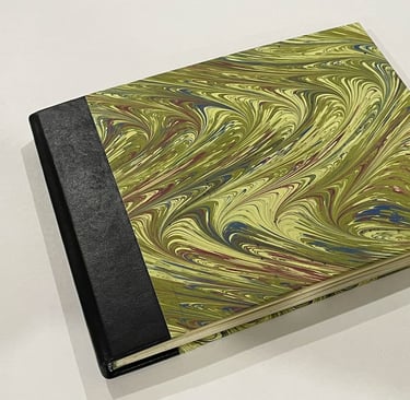 Album with marbled paper and decorative pages