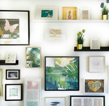 Various picture frames hanging on a wall